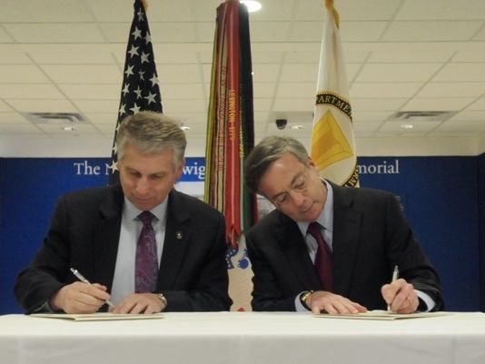 ACP and Army Reserve representatives signing initiative