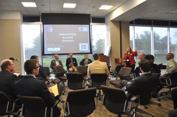 Attendees listening to panel discussion