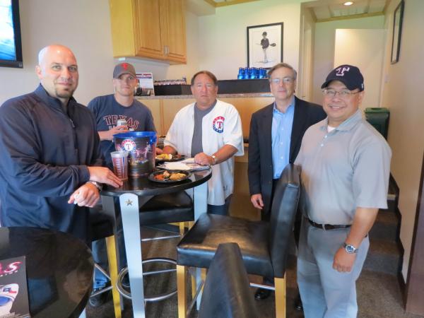 Sid Goodfriend and some of the attendees enjoying refreshments before the game