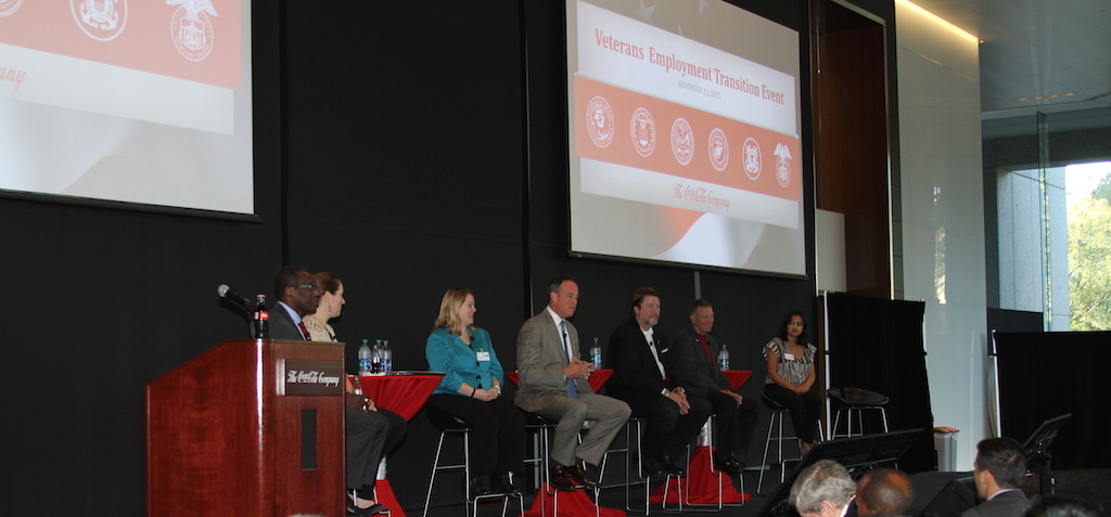 Panel members on stage